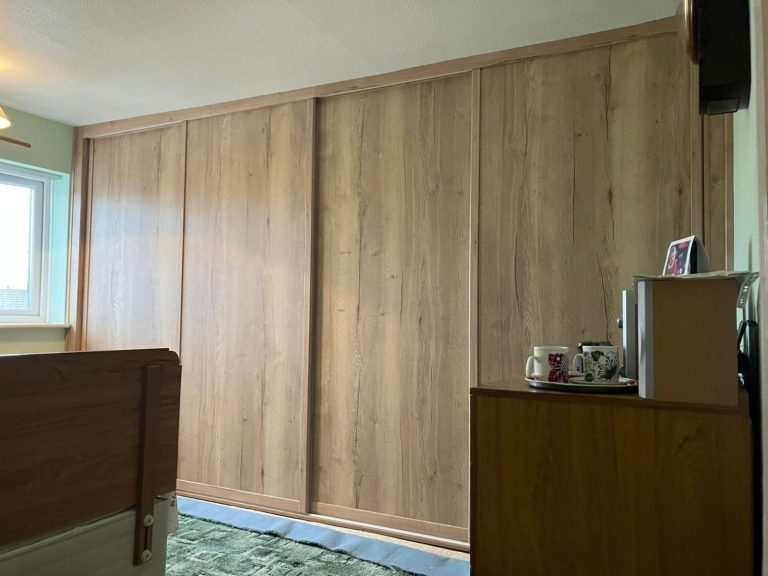 Halifax Oak Panel Swan Sliding Wardrobe Doors 1650